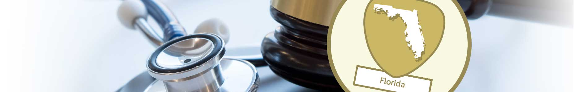 Gavel and stethoscope representing medical laws and rules on a light surface and the Florida state outline