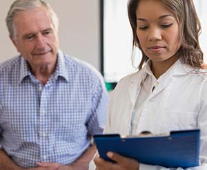 Occupational Therapist observing an adult