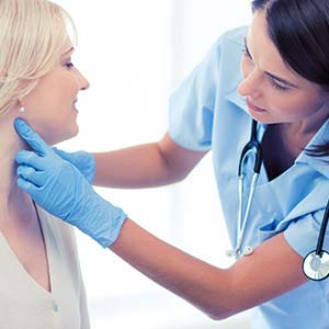 Nurse treating patient